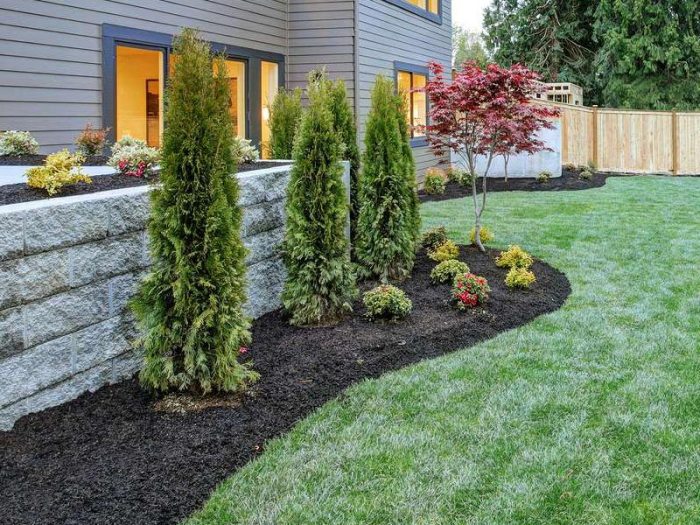 Arbor rock and wall landscaping